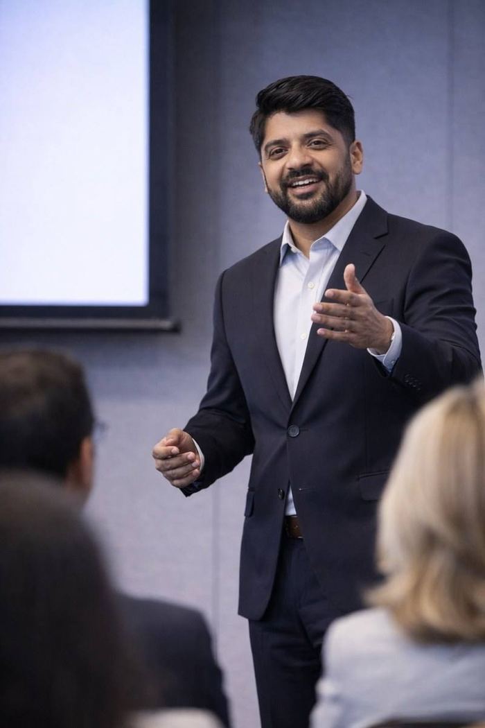 Sekhar presenting at a business conference